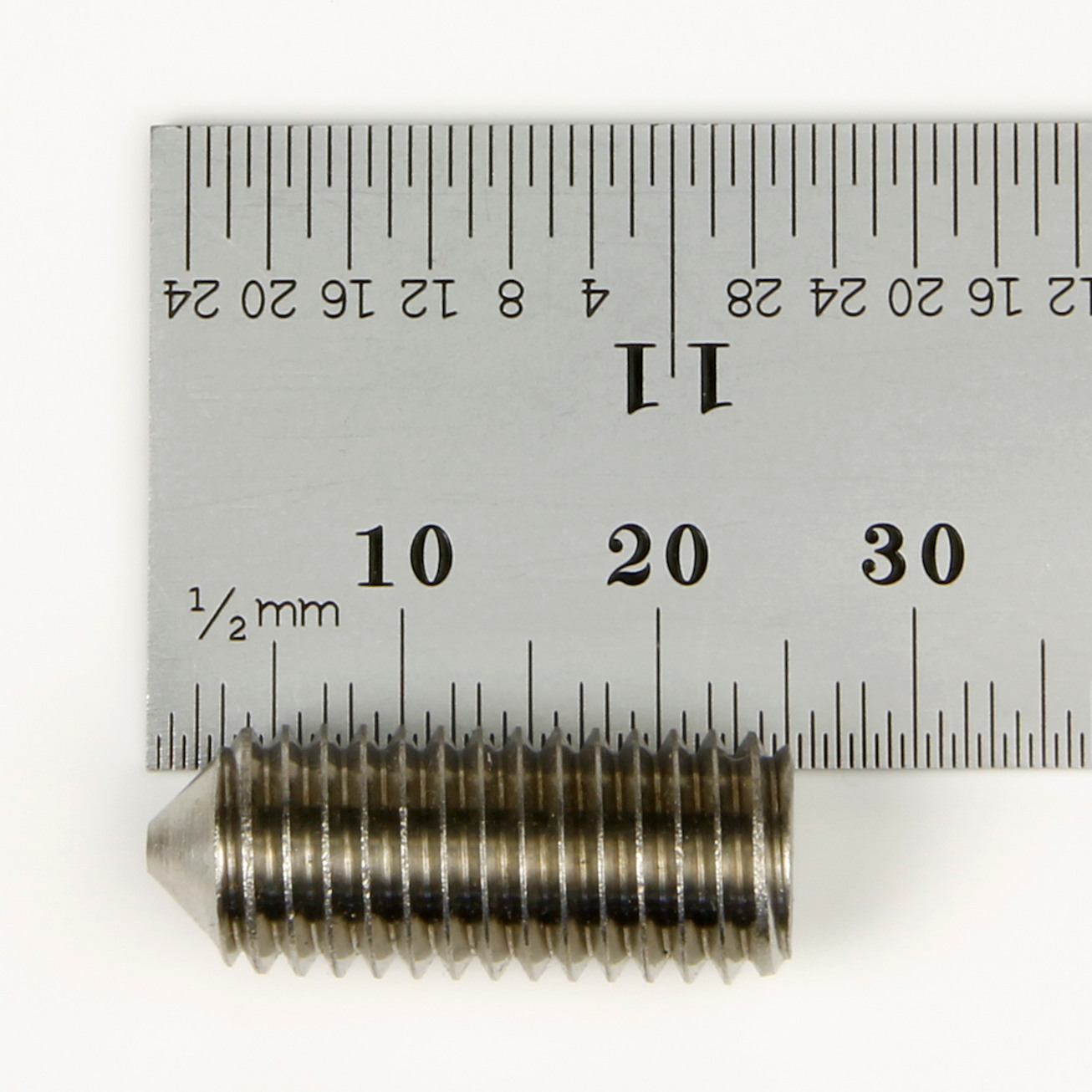 Grub screw length measured with a ruler